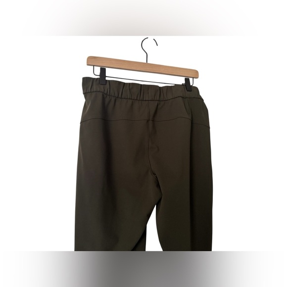 LULULEMON ATHLETICA On the Fly 7/8 Pant In Dark Olive Size 8 - Picture 3 of 9